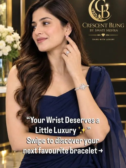 Model in a navy saree wearing an AD bracelet and ring